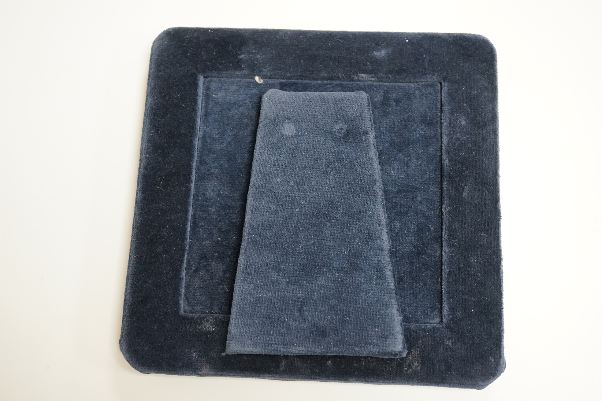 An Edwardian Art Nouveau silver mounted square photograph frame, by William Hair Haseler, Birmingham, 1904, 16cm by 16cm (later backing).